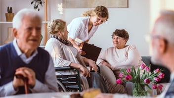 Nursing home nurse with residents, source, ftag citations