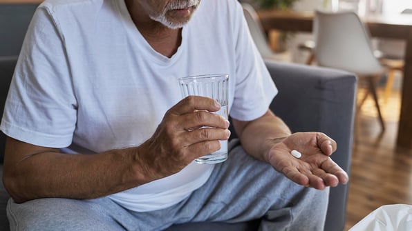 antipsychotic reduction, nursing home compliance, dementia care, non-pharmacological interventions, behavioral management, CMS regulations, gradual dose reduction (GDR), staff training, medication audits, Qsource consulting