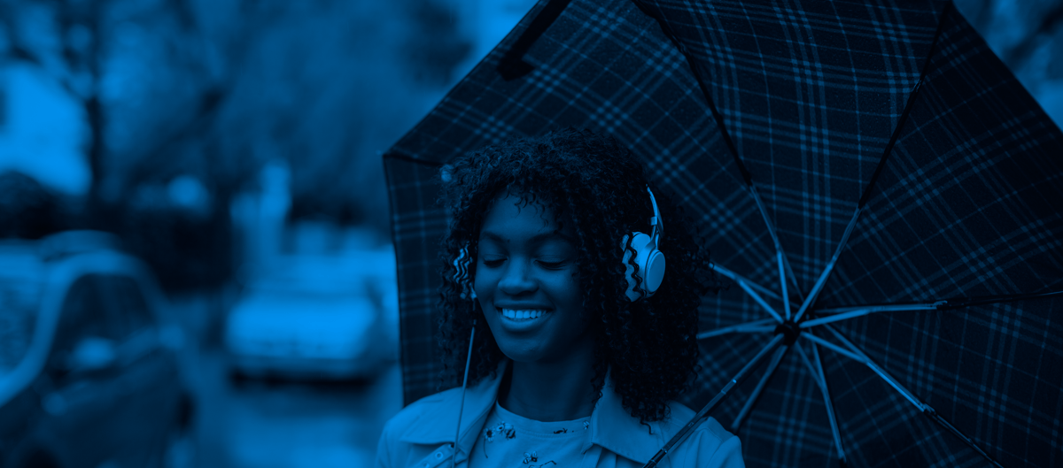 young-black-girl-with-umbrella-2023-11-27-05-20-45-utc-1