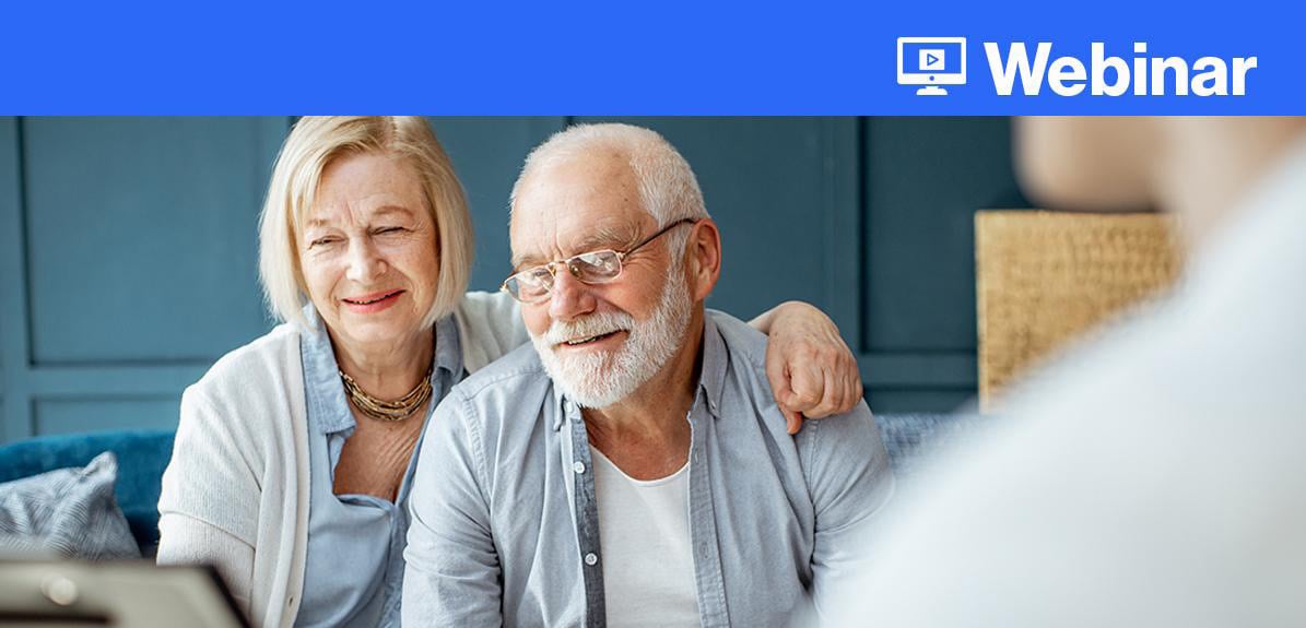 Two senior adults looking at a laptop with diabetes information