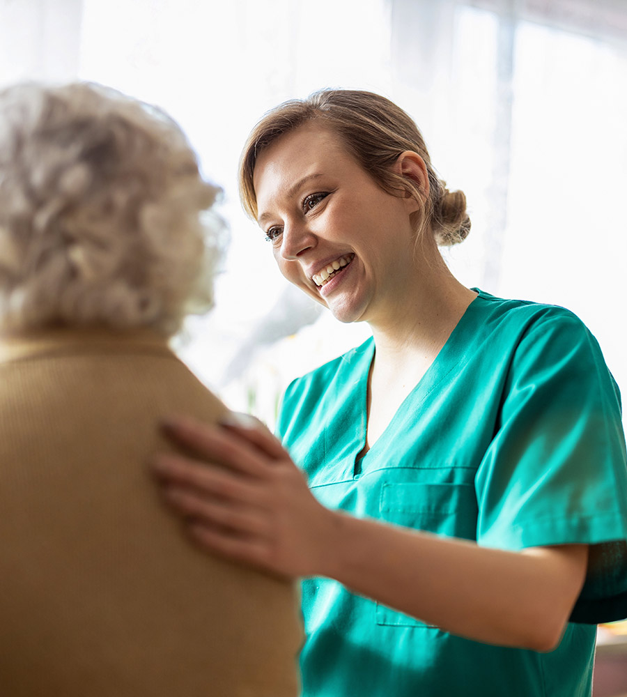 nurse with elderly patient