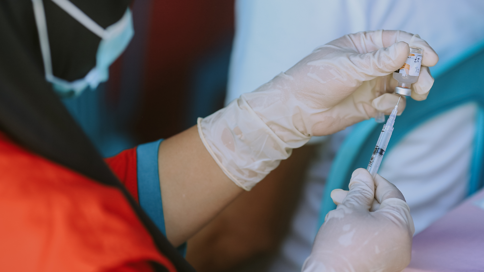 man getting covid vaccine