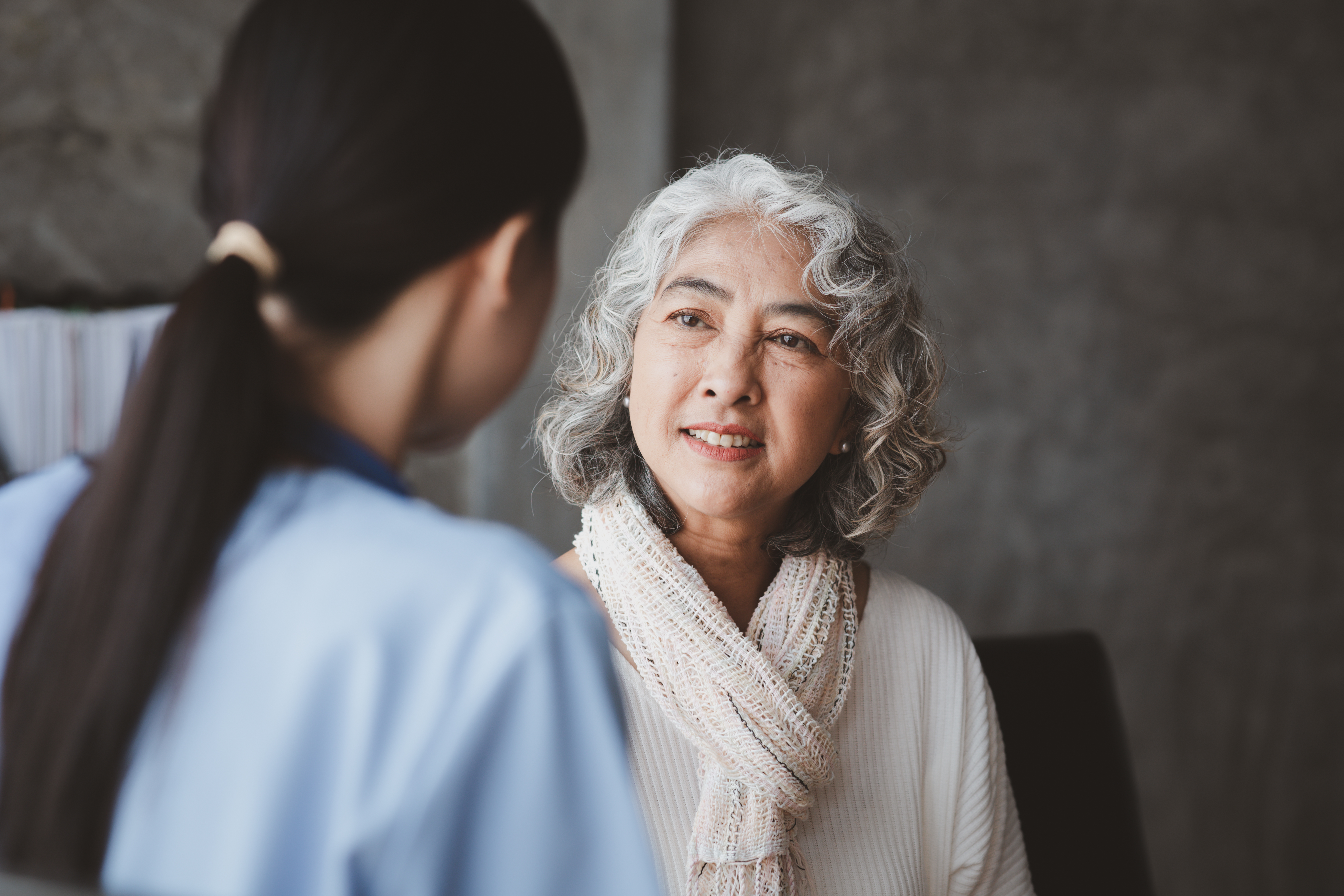 Nurse and patient talking