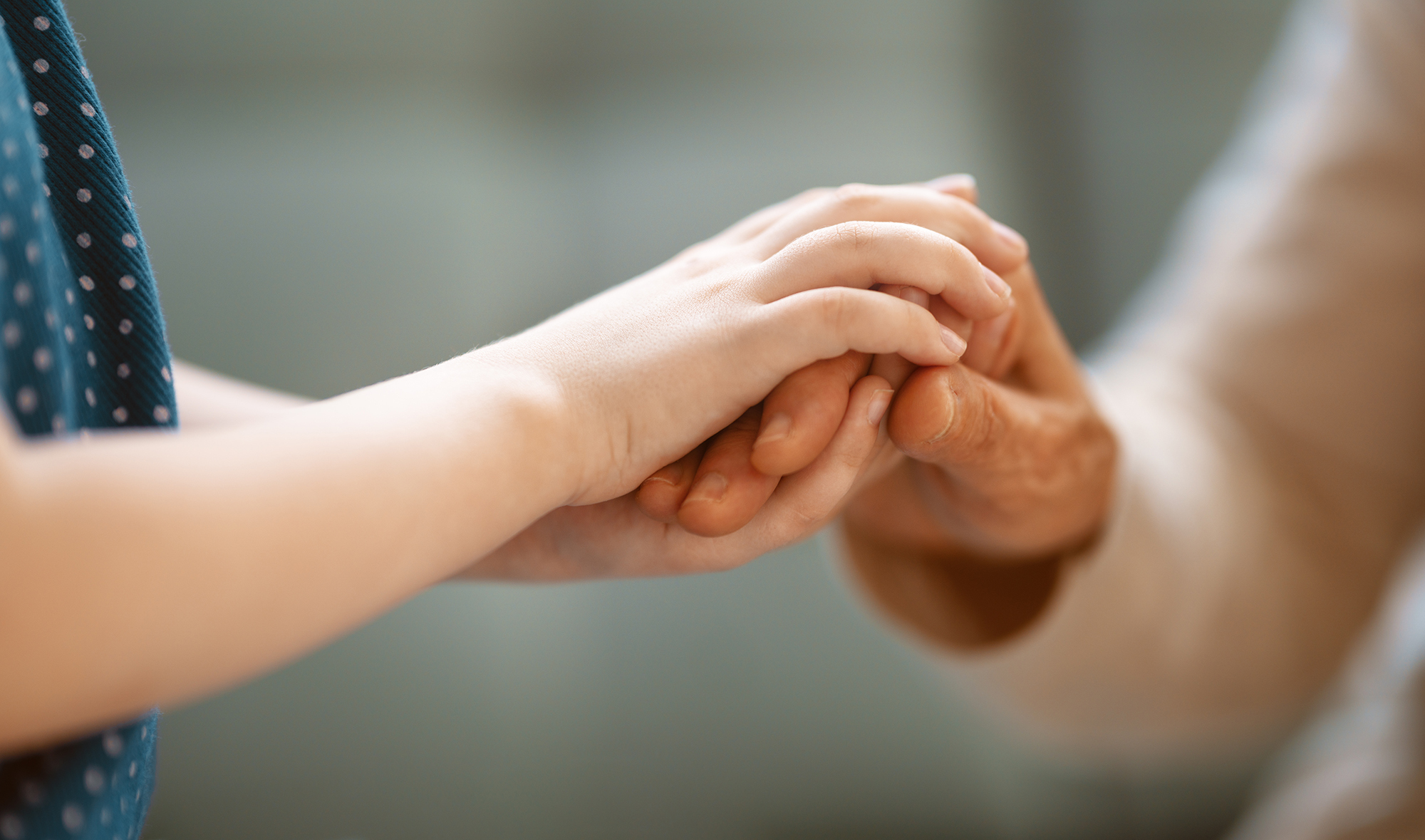 Nurse holding hands