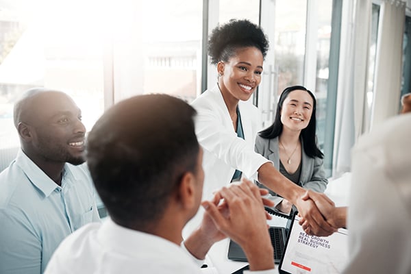 Physician with group of people