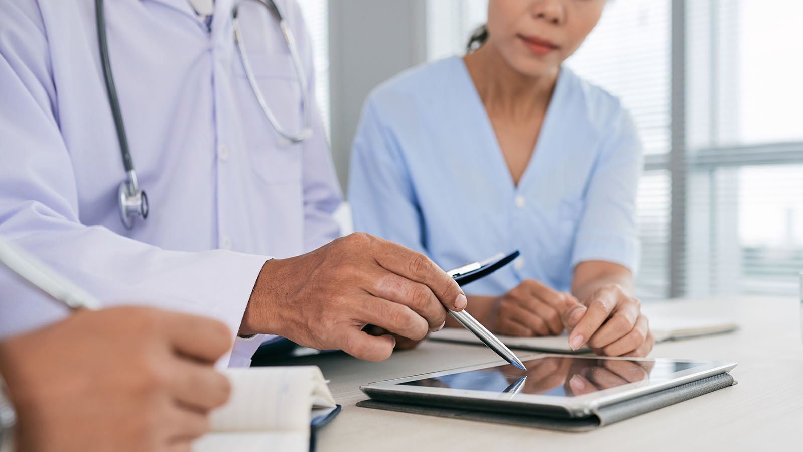 Nurses analyzing data